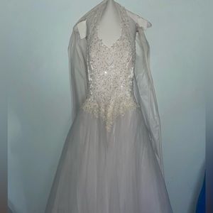 White halter wedding gown with pearls and clear beading design